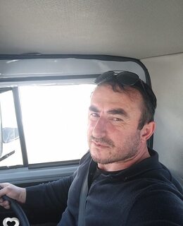 Али
